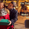 A couple smiling outdoors while holding a green gift box and a black sewing kit.