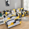 L-shaped sofa protector covers featuring a modern geometric pattern in black, gray, and yellow.