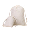 A natural beige cotton drawstring gift bag is shown, with its drawstring visible.