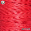 A close-up view of red wax thread embroidery cord being spooled.