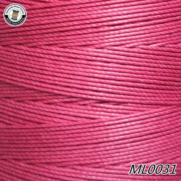 A close-up of pink embroidery thread cord labeled ML0031 with a circular logo.