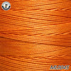 A close-up view of bright orange waxed thread embroidery cord coiled on a background.