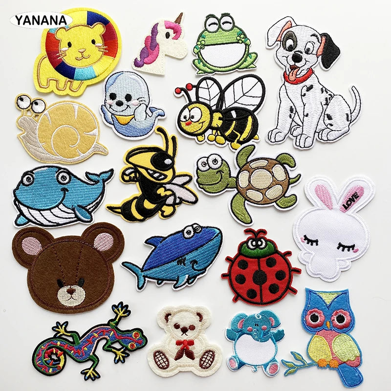 A collection of embroidered animal patches featuring various animals like a lion, frog, bee, and rabbit.