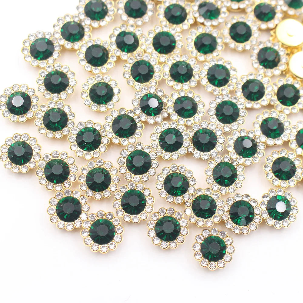 A close-up of green and clear crystal rhinestone sew-on buttons arranged in a sunflower pattern.