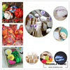 A collection of handmade cotton toy filler batting in various colors and shapes for crafting projects.