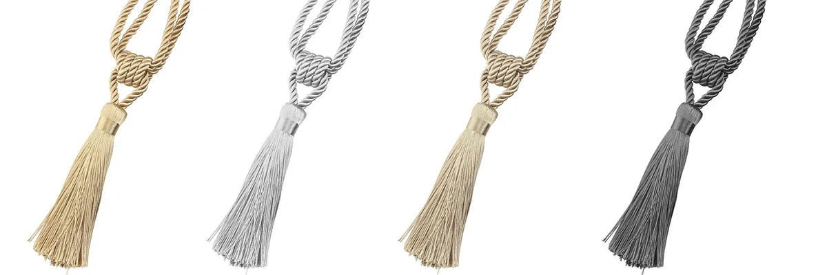 Four elegant curtain tiebacks made of twisted rope in beige, silver, gold, and gray tones with tassels.