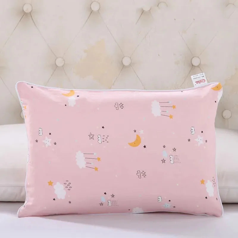 Pink cartoon style children's pillowcase with stars and clouds