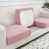 A pink textured seat cushion cover is shown on a white sofa, featuring a rectangular mirror design.