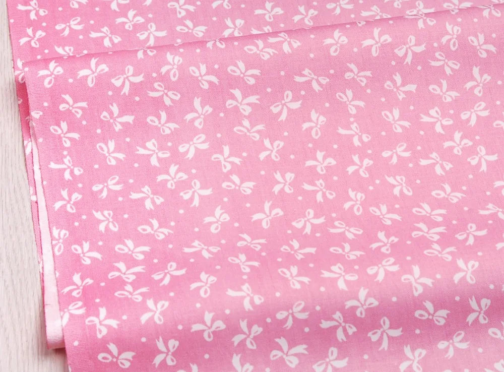 Pink floral and stripe cotton twill fabric for sewing and DIY with white patterns