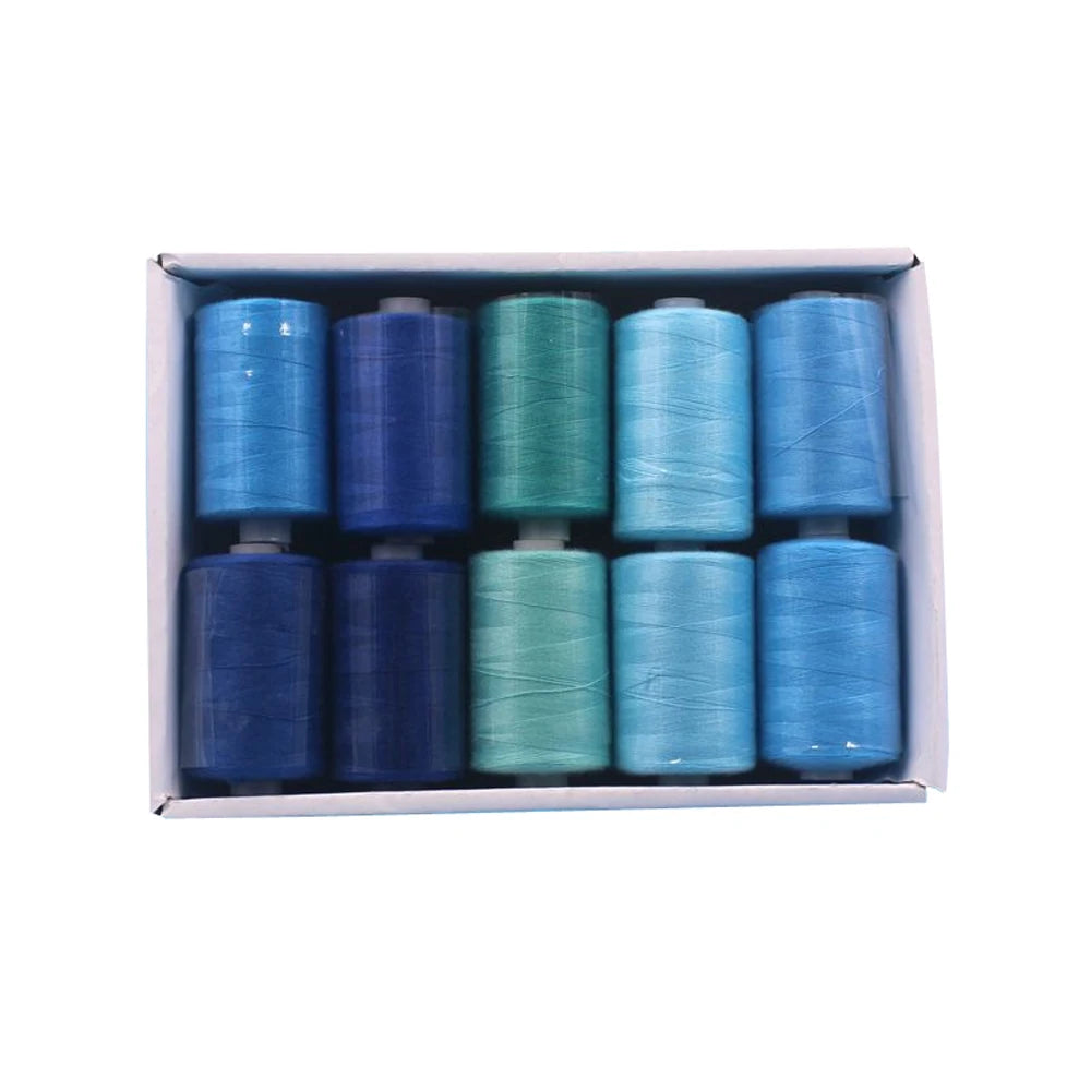A box containing ten colorful polyester sewing thread spools in various shades of blue and green.