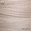 Spool of light beige waxed thread embroidery cord with a black and white logo visible.