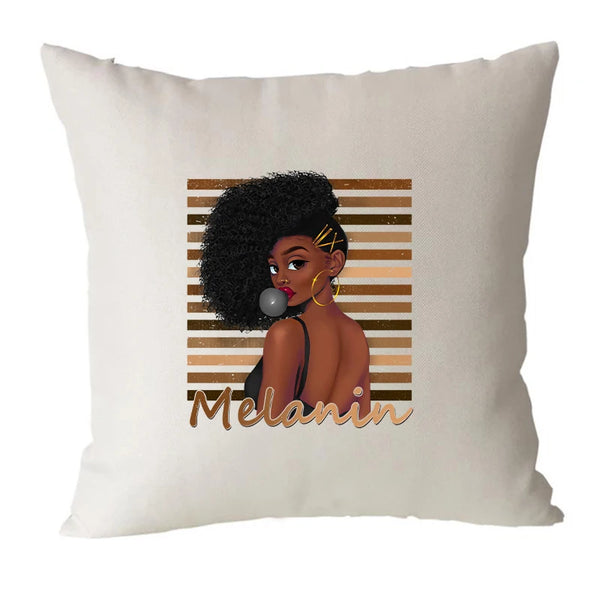 A beige throw pillow featuring a portrait of a woman with curly hair and gold hoop earrings, with the word melanin below.