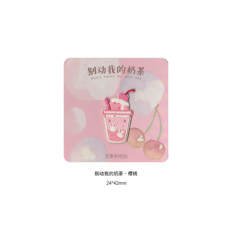 Pink iron-on embroidered patch featuring a pink ice cream cone design.
