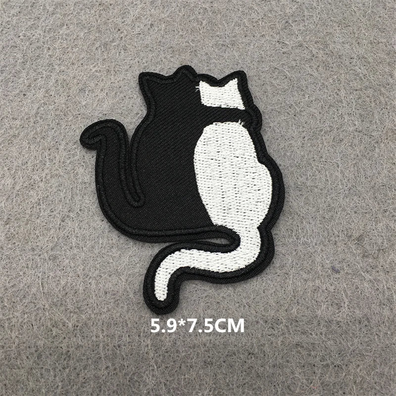 Black and white cat silhouette iron-on patch with embroidered details