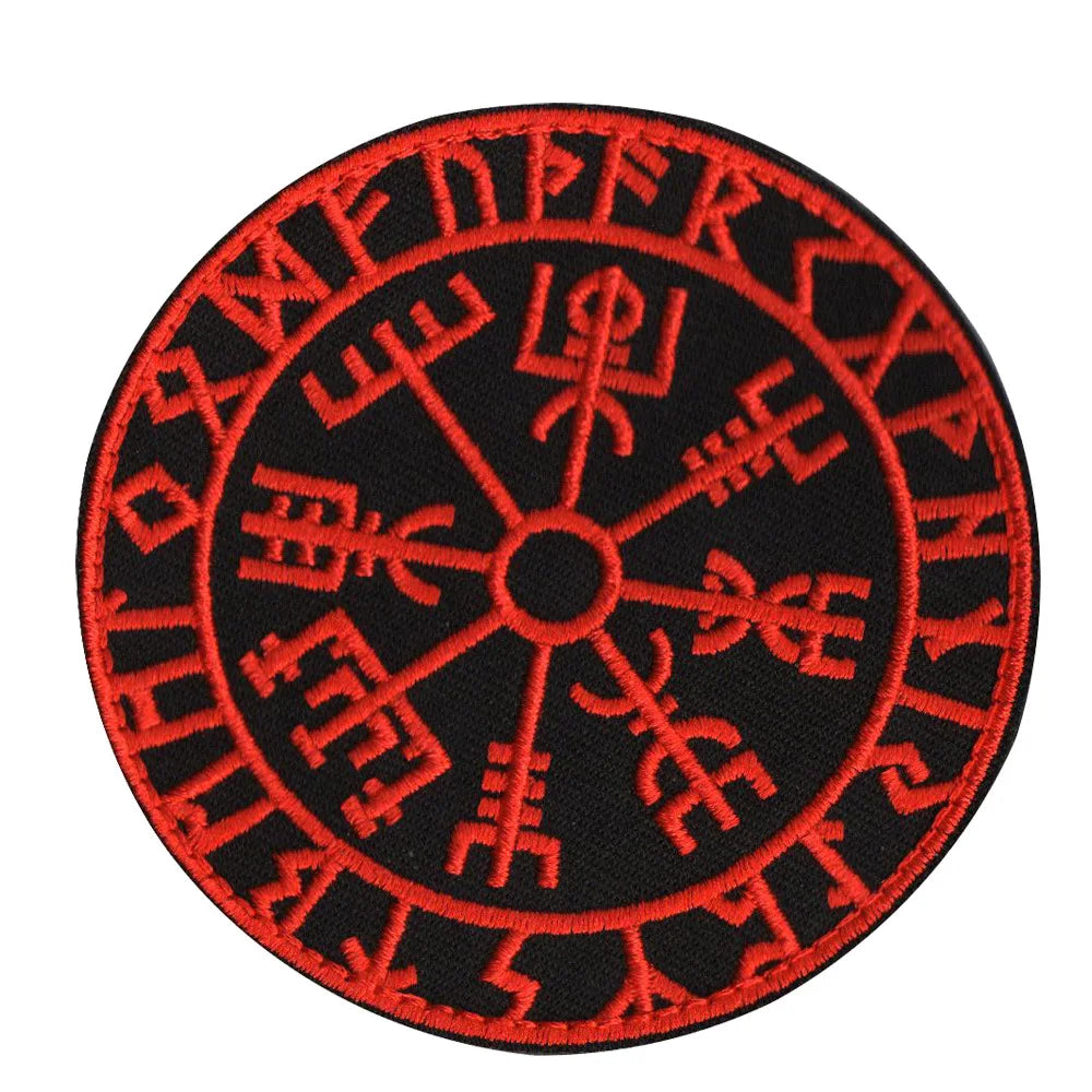 Red embroidered Valknut Viking patch with hook and loop backing on a black fabric.