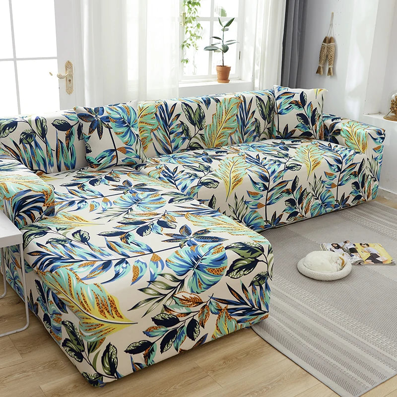 L-shape sofa protector covers featuring a floral and botanical print on a beige fabric.