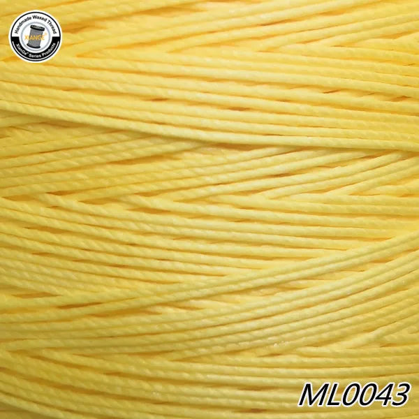 Yellow waxed thread embroidery cord spool with the product code ML0043