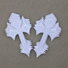 Two white embroidered cross applique patches for clothing displayed on a neutral background.