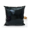 A square black pillow cover with a metallic shine finish.