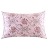 A square silk pillowcase with a light pink background and a delicate pink floral print.