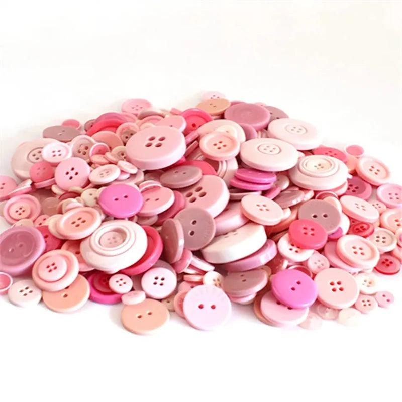 A pile of assorted pink and beige wooden buttons for scrapbooking