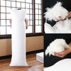 A white extra-long body pillow is shown standing upright next to a window, with close-ups demonstrating its fluffy texture.