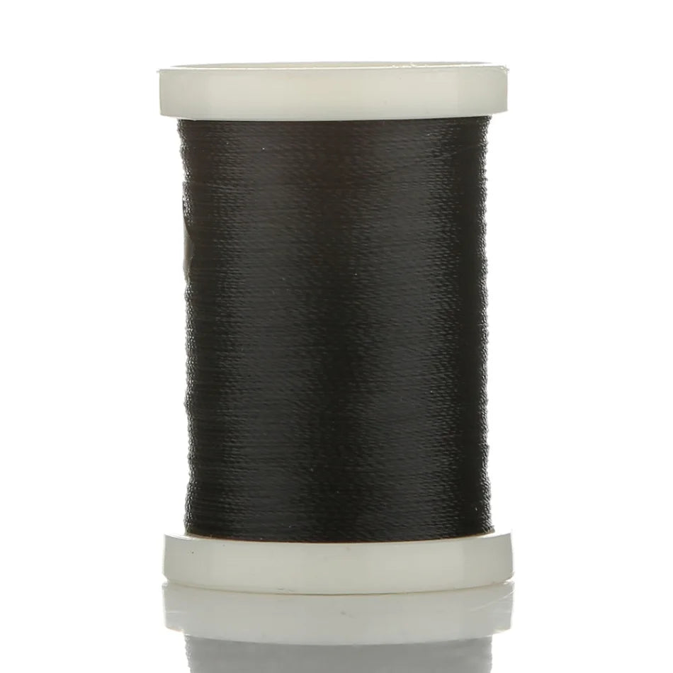 A spool of black multi-braided polyester fishing line on a white plastic core.