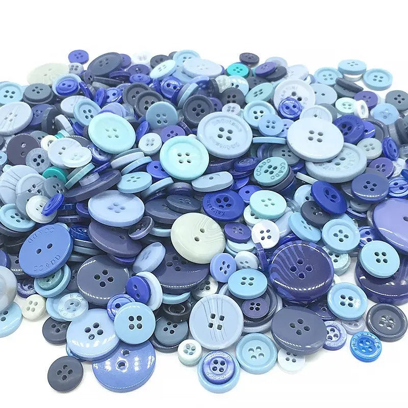A pile of assorted size and color wooden buttons for scrapbooking