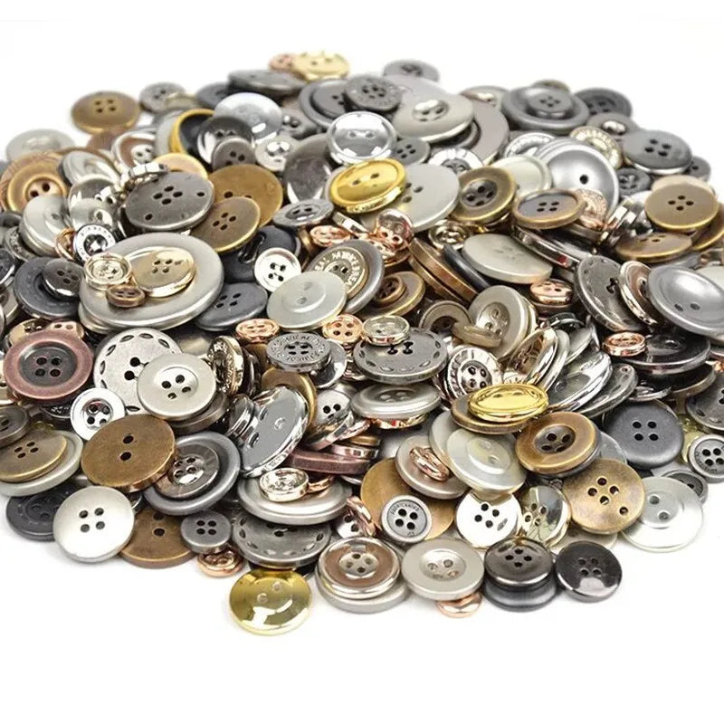 A pile of mixed size wooden buttons in various colors including silver, gold, and black.
