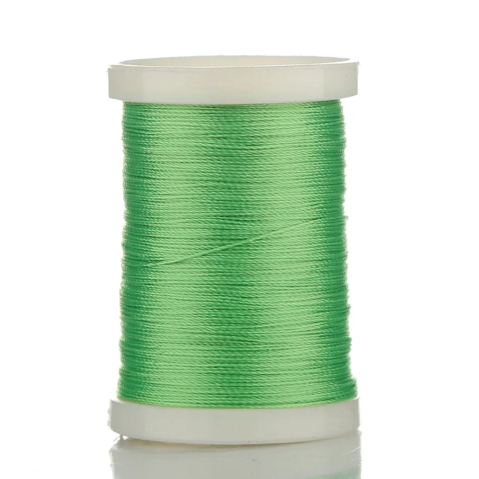 Spool of 150M multi-braided polyester fishing line in bright green