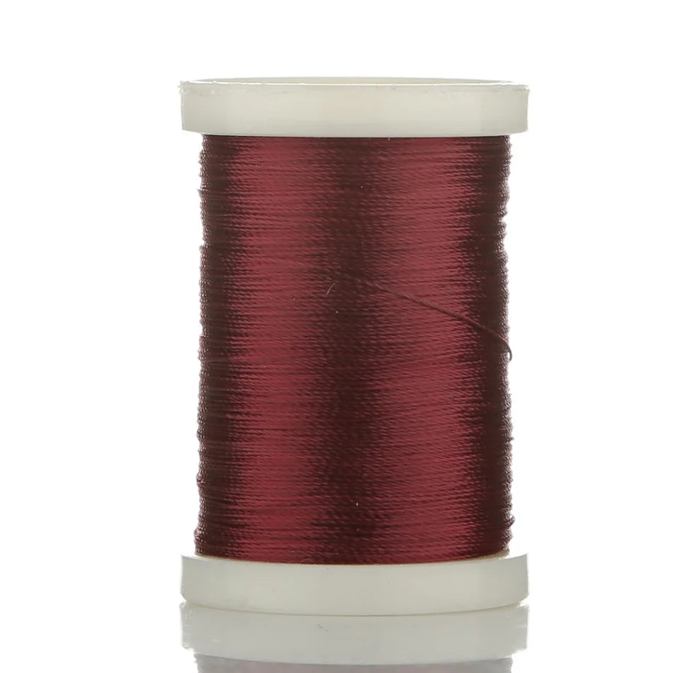A spool of 150M multi-braided polyester fishing line in a deep reddish-maroon color.