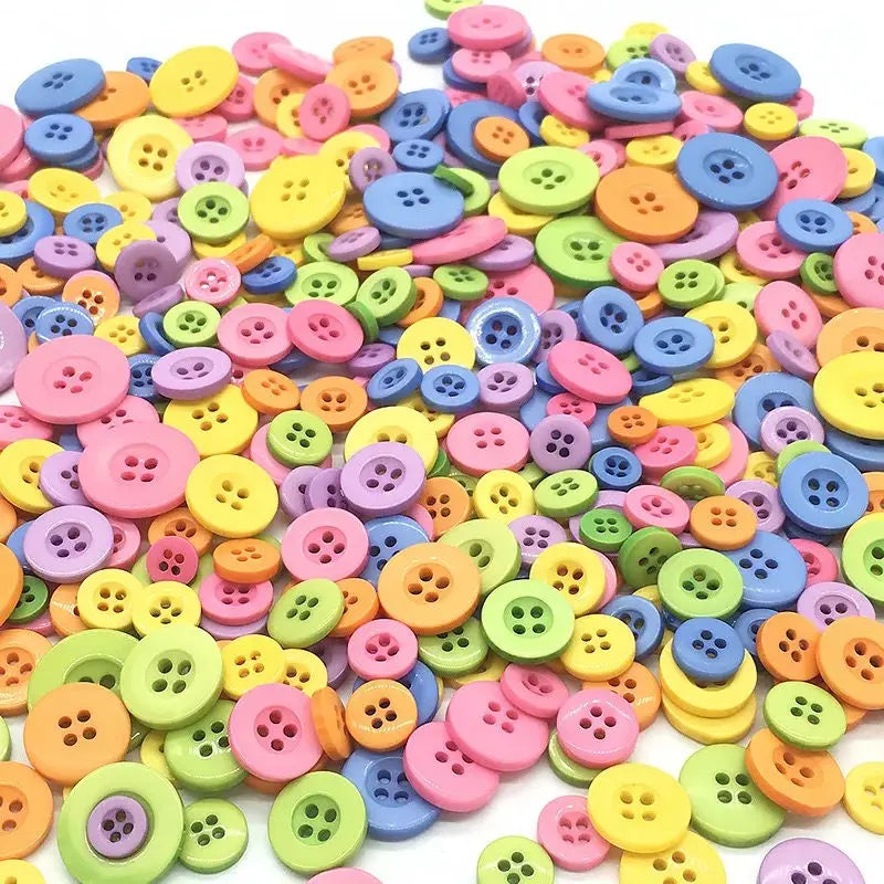 A large pile of assorted colorful wooden buttons in various sizes and shapes for scrapbooking