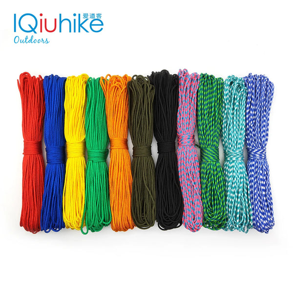 A collection of multi-colored paracord ropes in various bright colors, including red, yellow, green, orange, black, pink, and