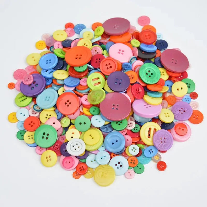 A colorful mix of round wooden buttons in various shades of pink, yellow, green, and blue.