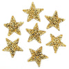A collection of gold glitter rhinestone star iron-on patches for clothing.