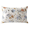 A square silk pillowcase with a light background featuring a floral print in shades of blue, brown, and green.