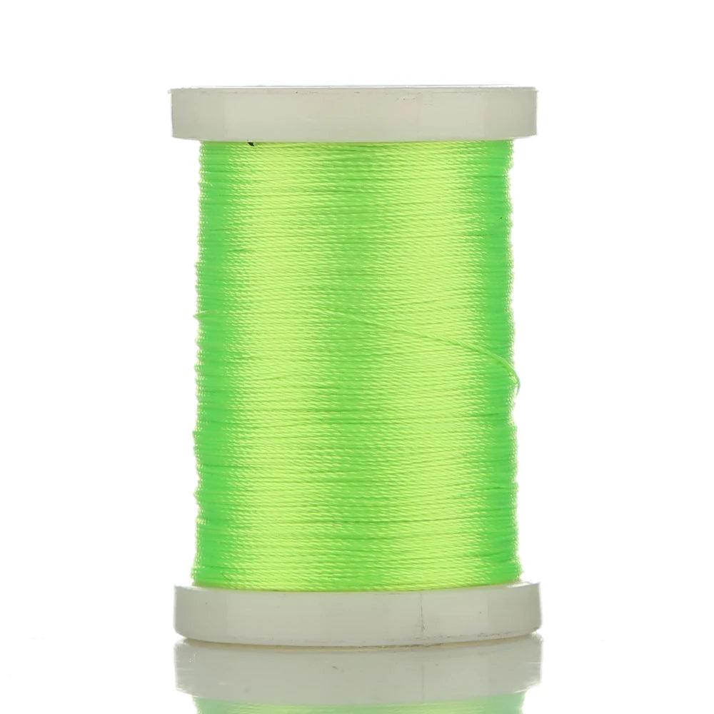 Spool of bright lime green multi-braided polyester fishing line on a white cylindrical spool.