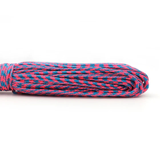 A coil of durable multi-color paracord rope featuring shades of red, blue, and black.