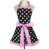 A pink polka dot ruffle apron with pockets displayed on a mannequin.