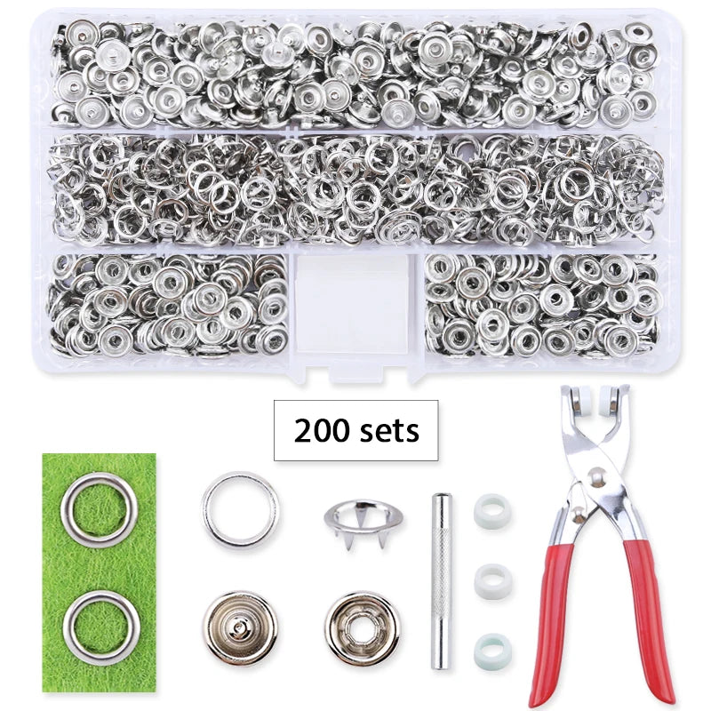 A set of heavy duty metal snap fasteners and pliers for crafting and repairs.