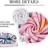 A close-up of soft and comfortable flannel fabric showing a swirl pattern in pink and white tones.