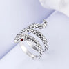 Silver animal finger rings featuring a textured snake design and a red gemstone.
