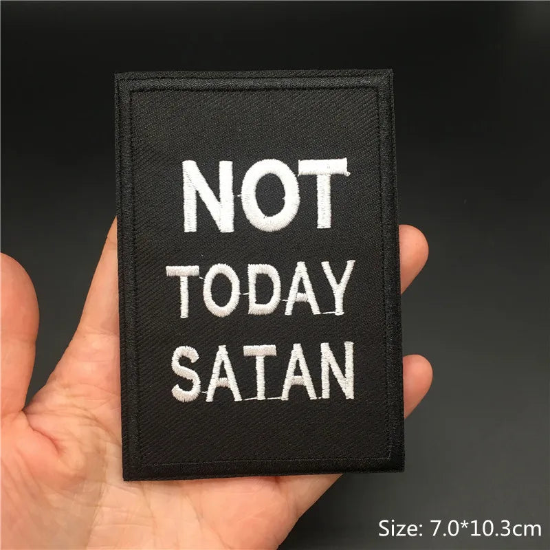 Black embroidered patch with white text saying NOT TODAY SATAN