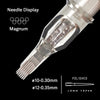 A close-up view of Magnum tattoo needles, showing various sizes and a polished long taper tip.