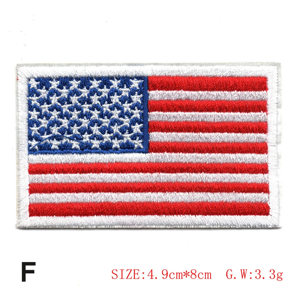 Embroidered American flag patch featuring red and white stripes and blue stars on a white background