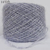 A ball of silver metallic merino wool yarn used for hand knitting.