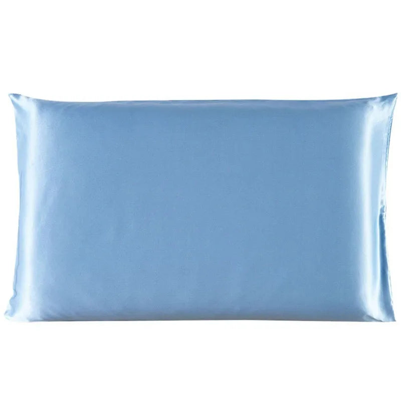 A smooth, light blue satin pillowcase folded neatly.