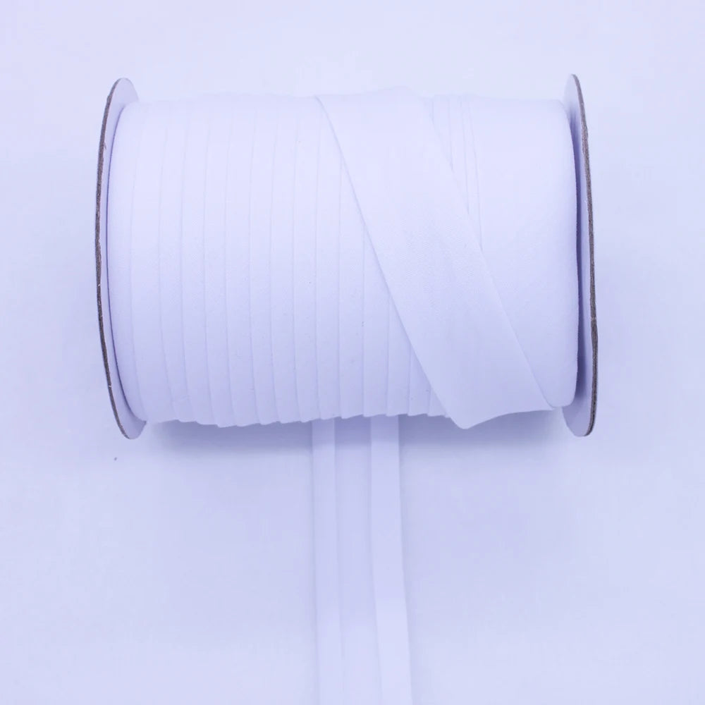 A roll of white durable bias tape binding ribbon with a visible core.