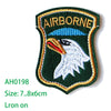 Embroidered iron-on patch featuring a green shield with the word AIRBORNE and a white eagle head.