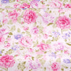 Pink floral and stripe cotton twill fabric featuring pink and purple roses on a white background